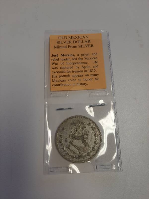 lot 1517 image: Old Mexican silver dollar