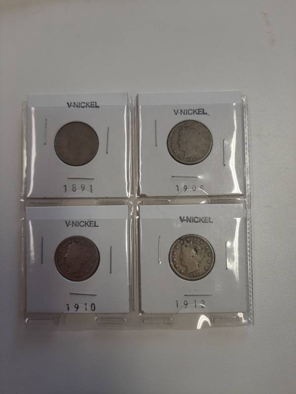 lot 1521 image: Card of 4 V Nickels