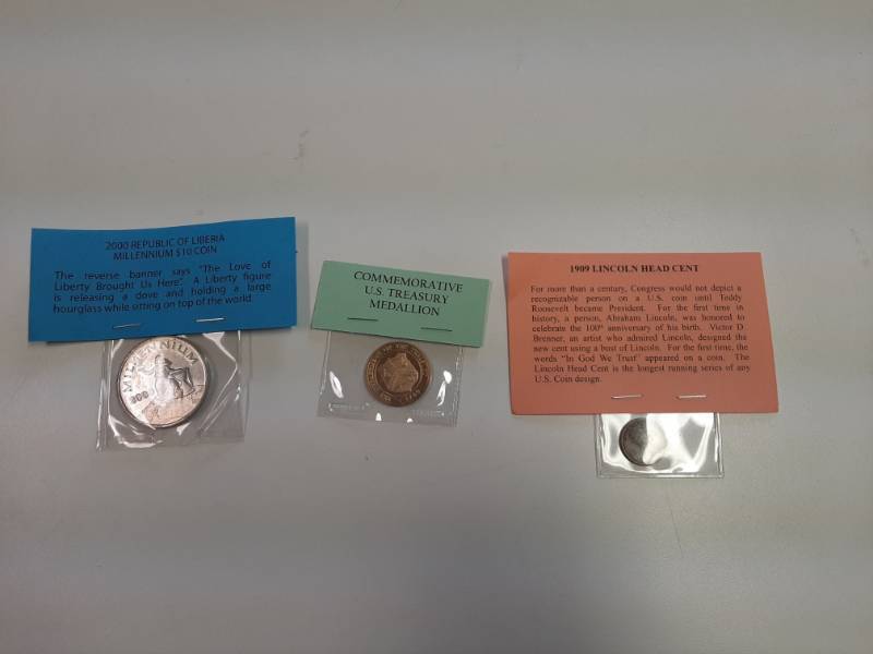 lot 1530 image: 1909 Lincoln head cent, Republic of Liberia $10 Coin and commemorative US Treasury medallion