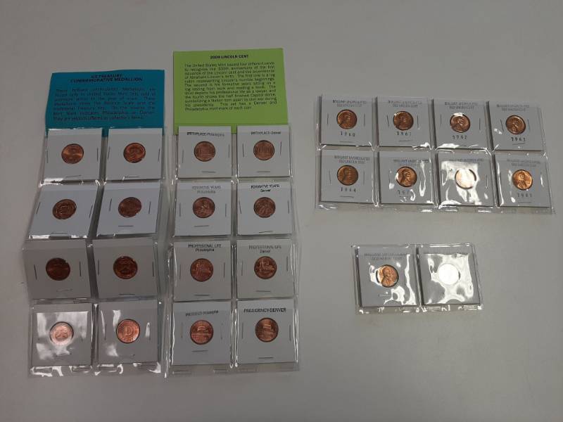 lot 1534 image: 4 cards of pennies and medallions
