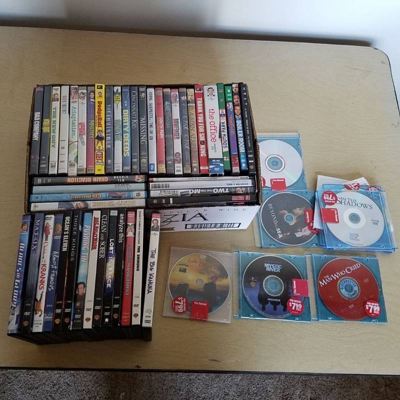 lot 6300 image: lot of assorted DVDs