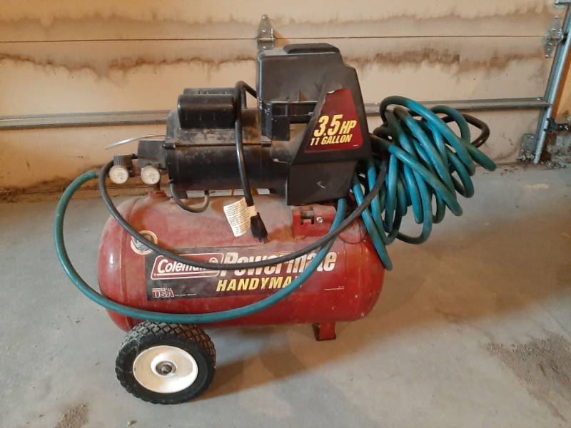 lot 1543 image: Coleman powermate air compressor - with hose