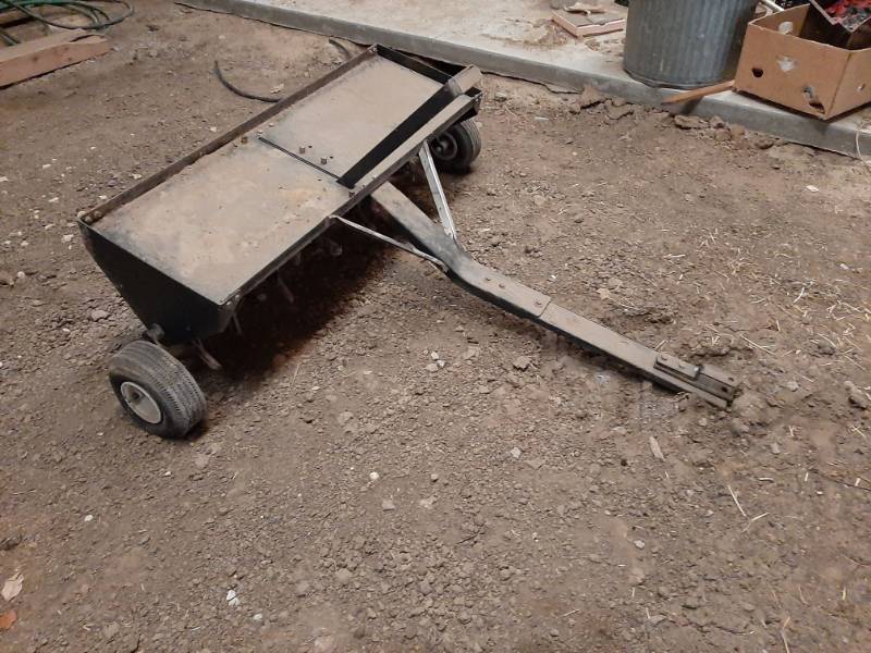 lot 1565 image: Lawn aerator with 2 weights