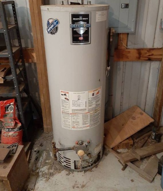 lot 1568 image: 50 gallon gas water heater - was working when removed and replaced with tankless water heater