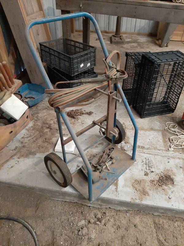 lot 1574 image: Bottle cart with torch and gages