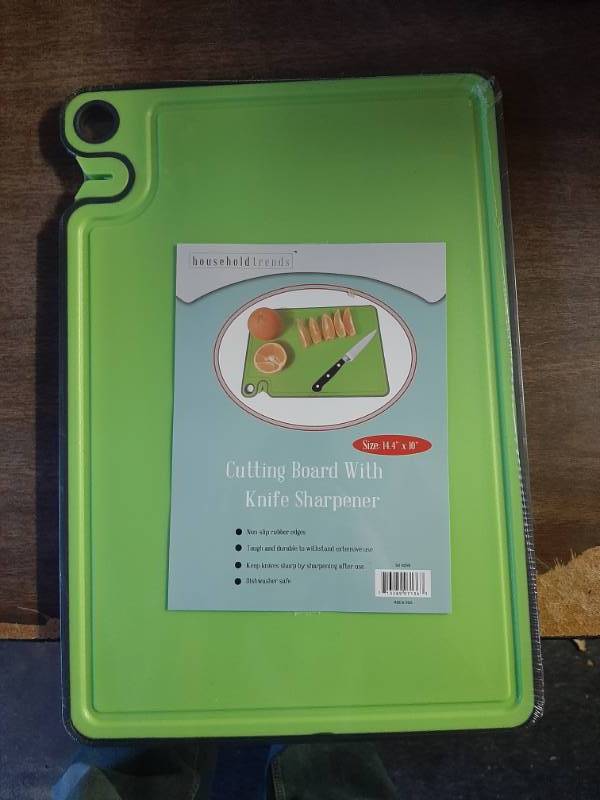 lot 1602 image: Cutting board with knife sharpener