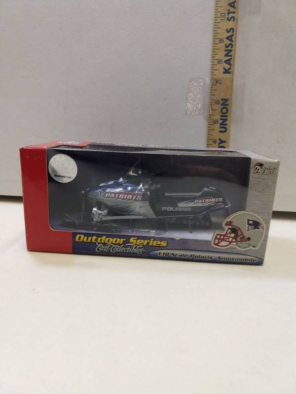 lot 2892 image: New England Patriots 118 Scale Polaris Snowmobile