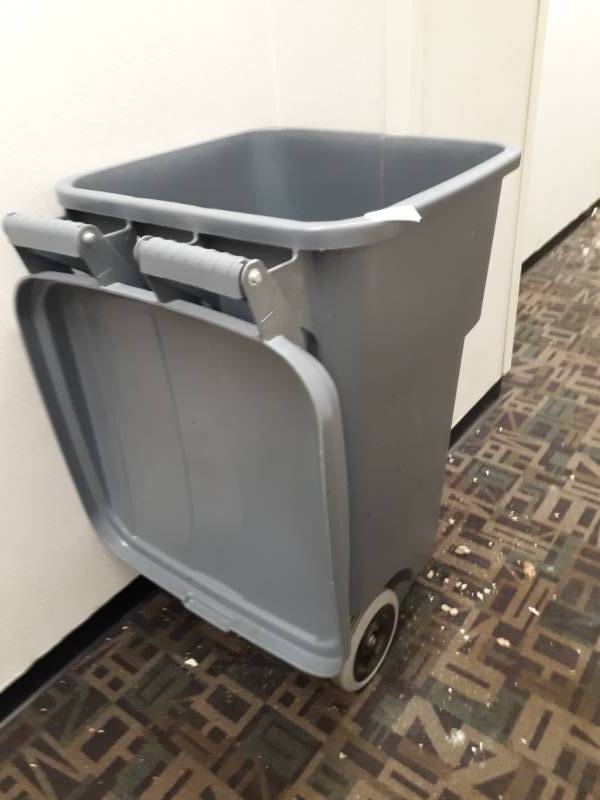 lot 8929 image: Rolling Trash Bin