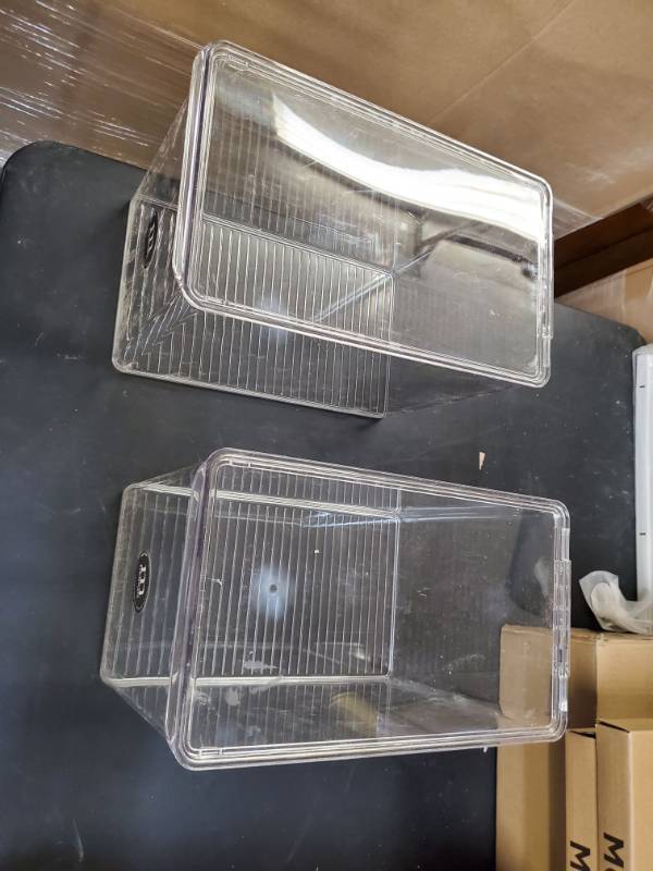 lot 16203 image: 2 Clear Plastic Storage Bins