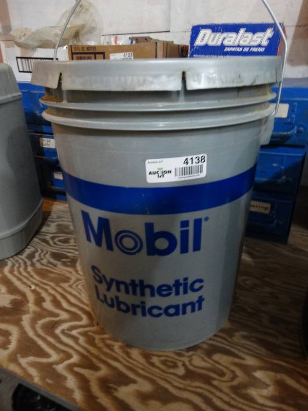 lot 4138 image: Partial bucket of Mobil Synthetic lubricant