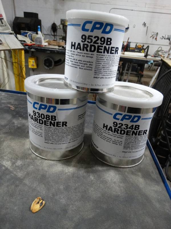 lot 4161 image: 3 smaller cans of CPD 9529B Hardener, 9308B hardener & 9234B hardener