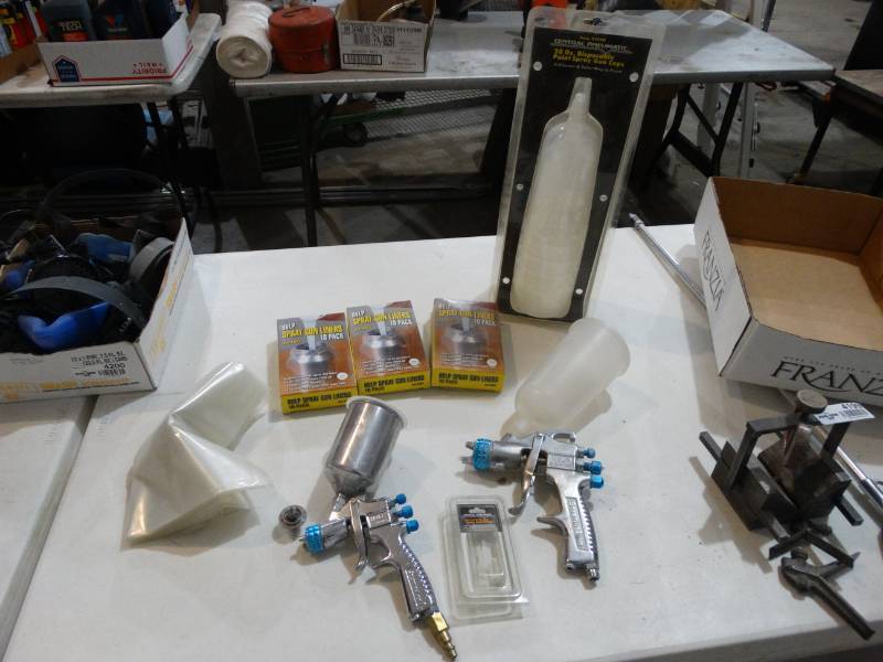 lot 4201 image: 2 air paint guns 30 spray gun liners new 20 oz spray gun cups & more
