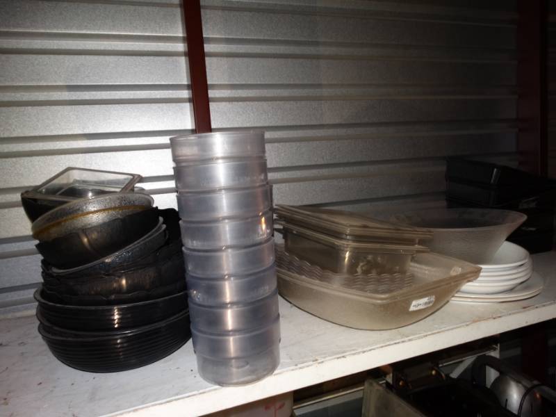 lot 4910 image: Large lot of various plastic & china plates bowls & misc. serving dishes
