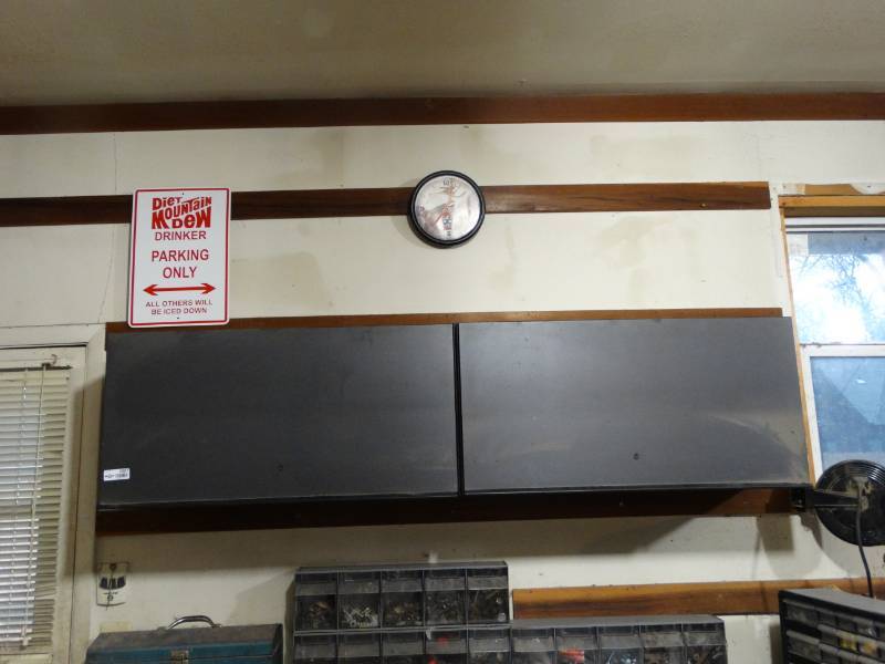 lot 2007 image: Two Metal Wall Mounted Garage Shelves  Contents Not included