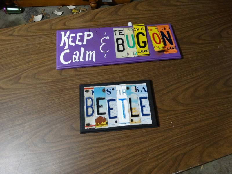 lot 2060 image: Handmade Signs made out of license plates