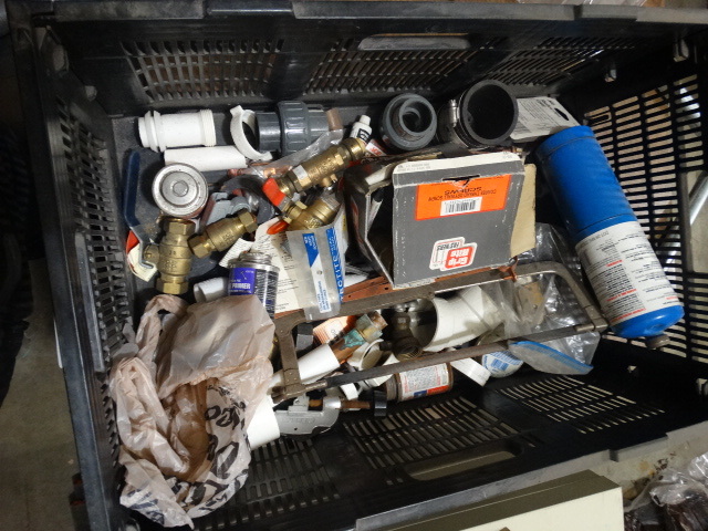 lot 2163 image: Tote of misc plumbing accessories and hardware