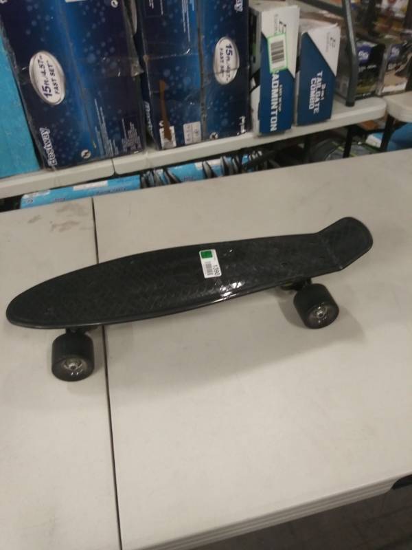 lot 1390 image: Small Black Childrens Skate Board