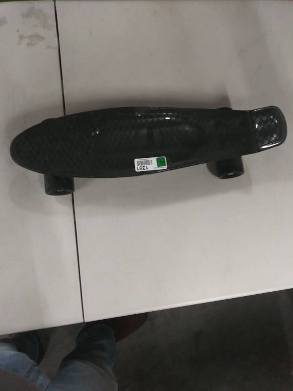 lot 1391 image: Small Black Childrens Skate Board