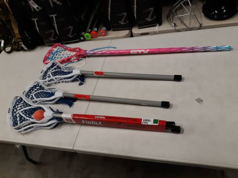 lot 1643 image: 5 Lacrosse Sticks