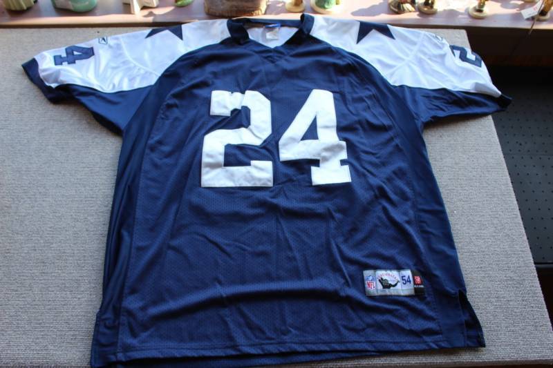 lot 2432 image: Reebok NFL Throwbacks Authentics Dallas Cowboys Jersery #24 Tiki Barber Size 54