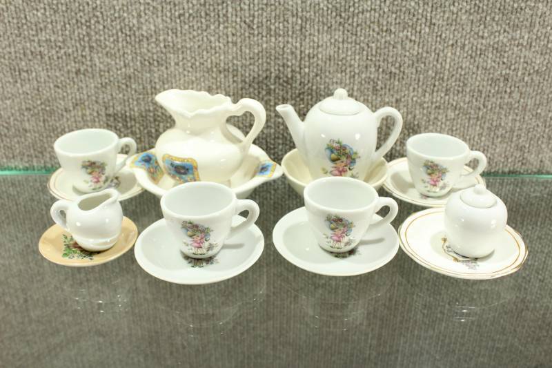 lot 2468 image: Large Lot of 16 Assorted Childs Tea Set Dishes.