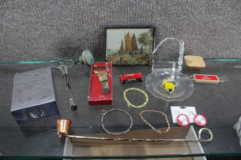 lot 2489 image: Lot of 15 Assorted Vanity Housewares Decor Items. Candle Snuffer, Bottle Openers, and Ring Holder Included.