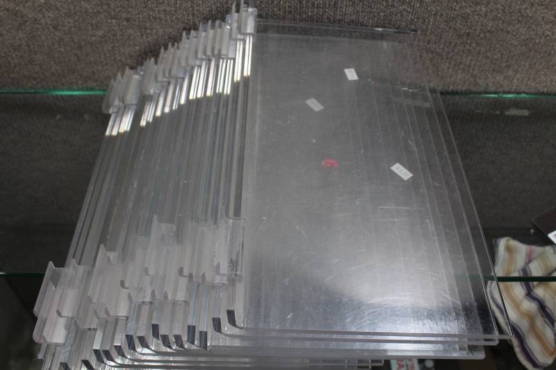 lot 2508 image: Lot of 17 Plexiglass Slatwall Shelves 16X8