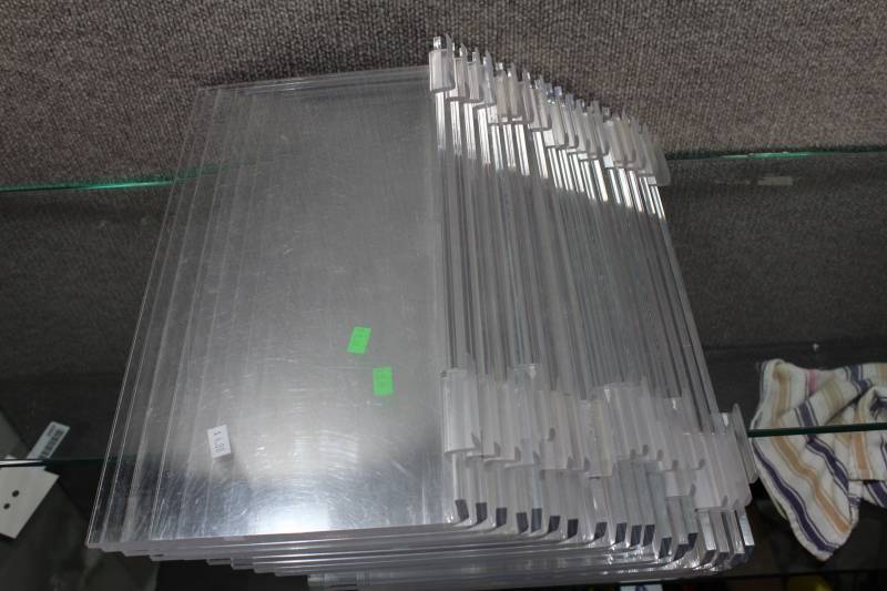 lot 2507 image: Lot of 18 Plexiglass Slatwalll Shelves 16X8