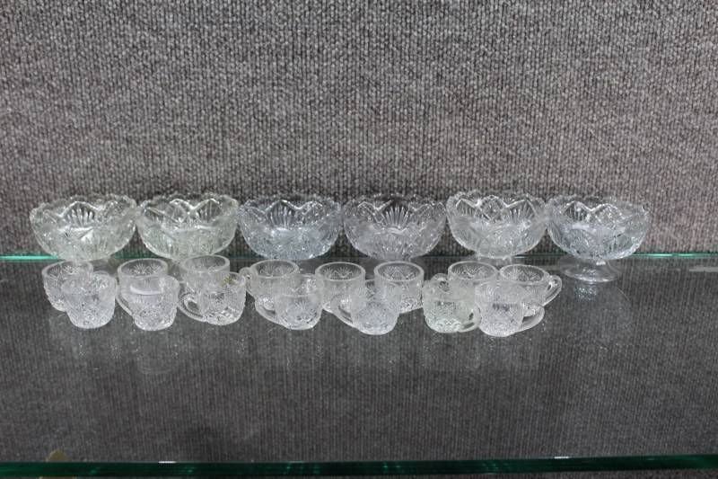 lot 2465 image: Lot of 21 Cut Glass Dishes. 6 Small Bowls, 15 Childs Tea Cups