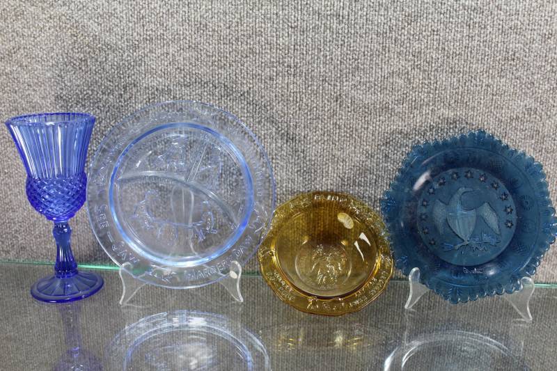 lot 2467 image: Lot of 4 Vintage Colored Glass Dishes. Two Childs Dishes Two Cobalt Blue Glass Pieces.