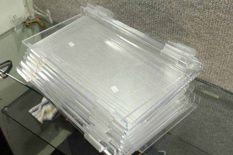 lot 2519 image: Lot of 17 Plexiglass Slatwall Shelves 16X8