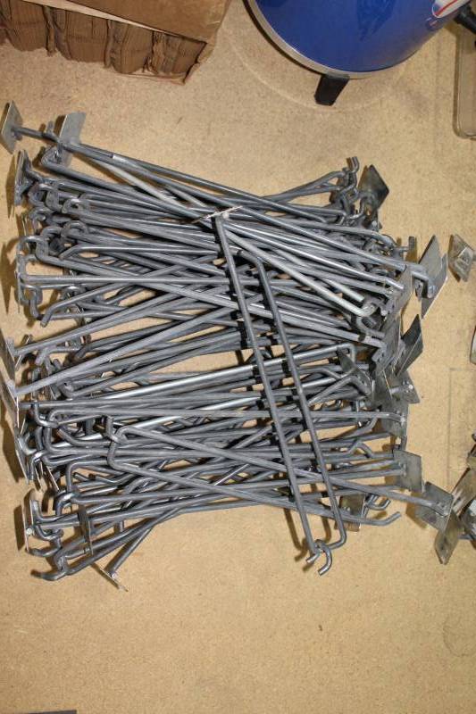lot 2528 image: Lot of 50 Metal 12 Pegboard Peg Hooks With Price Mount