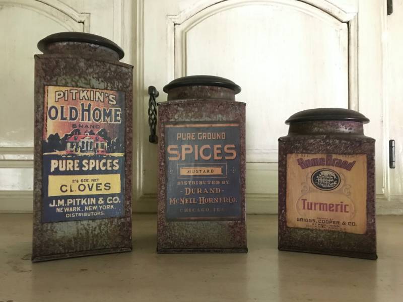 lot 1017 image: Rust colored tin canisters with vintage looking labels--Set of 3