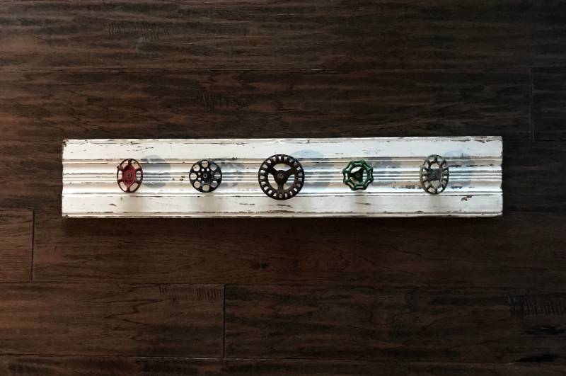lot 1037 image: Rustic Wood Wall Hook made from colored spout handles--very unique