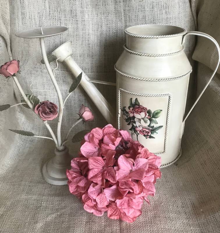 lot 1090 image: Tin Watering Can decor and rose accented candle holder