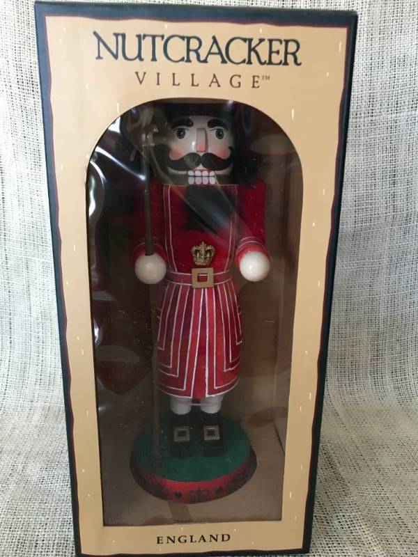 lot 1103 image: 12 England Nutcracker in box--10th Anniversary Nutcracker Village Special Edition