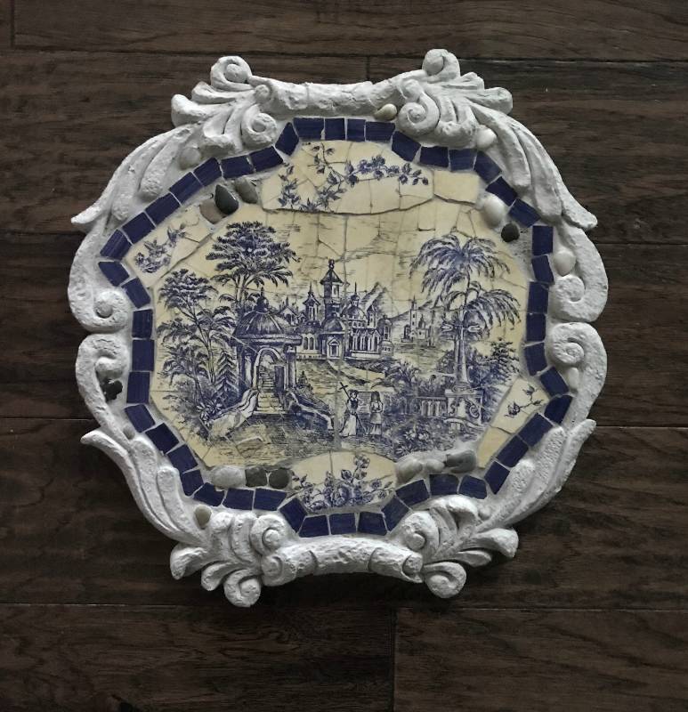 lot 1133 image: Mosaic stepping stone in blue and yellow (base is resin)