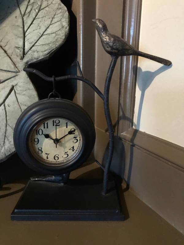 lot 1202 image: Cast Iron shelf clock with bird on branch-12 tall