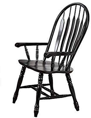 lot 17404 image: Sunset Trading Black Armchair, Small Crack In Seat
