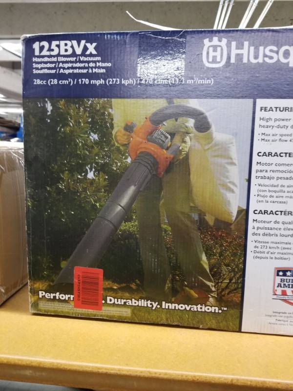 lot 17667 image: Husqvarna 125BVx, 28cc 2-Cycle Gas 470 CFM 170 MPH Handheld Leaf BlowerVacuum - 952711902