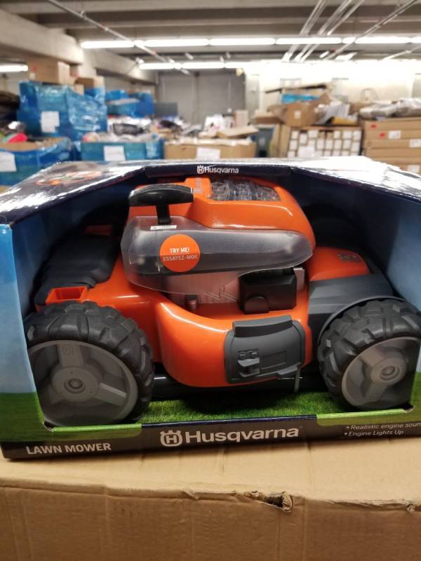 lot 17669 image: Husqvarna Toy Lawnmower.