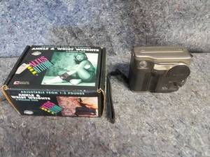 lot 14055 image: AnkleWrist Weights and Digital Camera