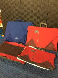 lot 1534 image: Lot of 4 Eagle Creek Garment Folders