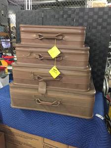 lot 1587 image: Coats and Clark Touche 4 Piece Luggage Set.