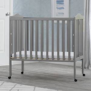 lot 1935 image: Delta Children Folding Portable Crib with Mattress