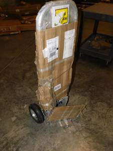 lot 1880 image: Aluminum Dolly open box inspect for parts and condition