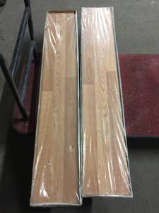 lot 4034 image: 2 Boxes of VersaLock Plank Flooring
