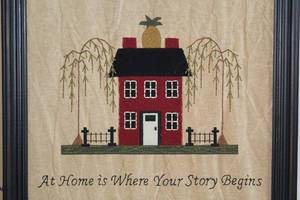 lot 1541 image: New in Box At Home America A Familys Story Framed Stitchery