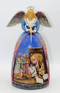lot 1732 image: Jim Shore A Star Shall Guide Us  Heartwood Creek Musical Angel - Plays O Holy Night