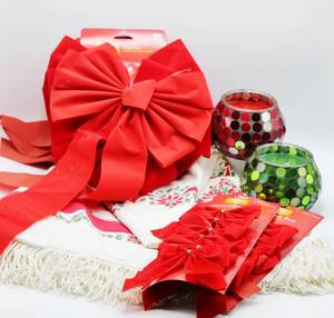 lot 1740 image: Vintage Christmas Tablecloth with fringe detail, (2) new Mosaic Jar Candles and Red Bows for decorating